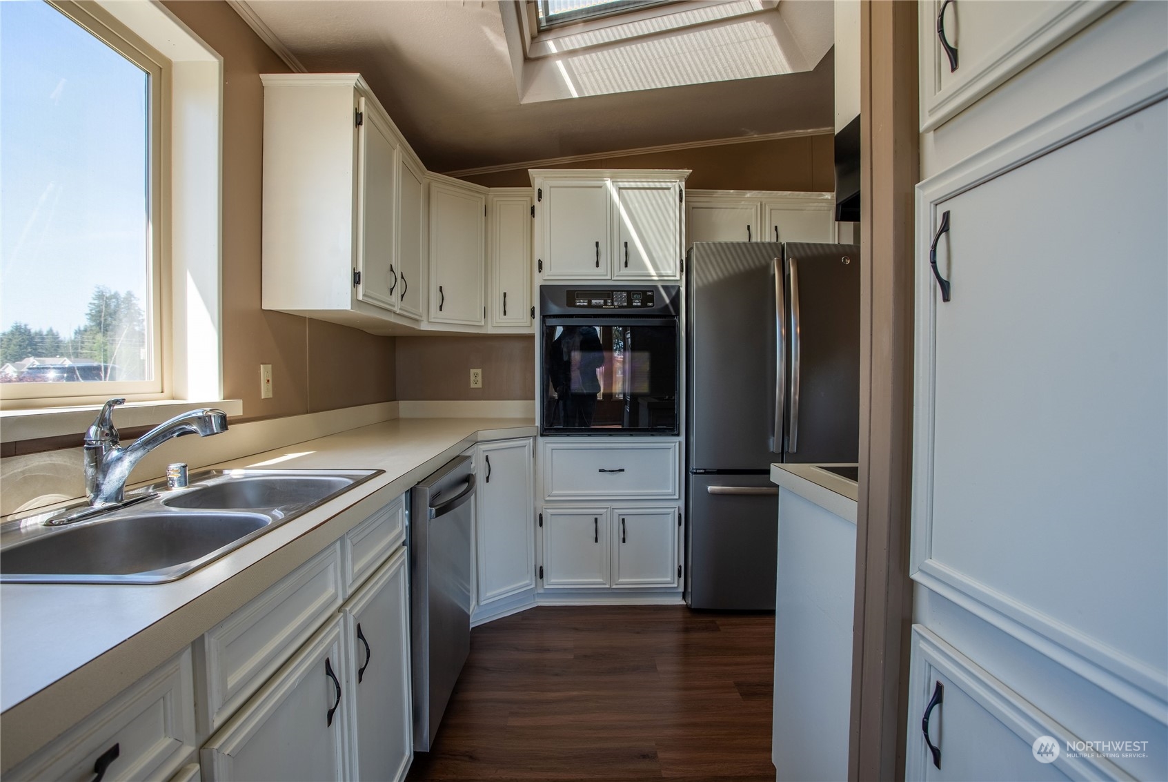 1040 Shorey Road Chehalis, WA 98532 - Photo 9 of 38 a kitchen with a sink appliances and cabinets