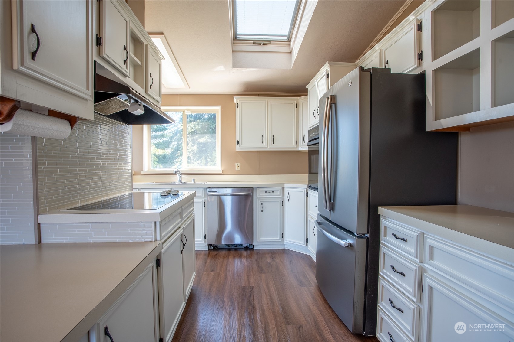 1040 Shorey Road Chehalis, WA 98532 - Photo 10 of 38 a kitchen with stainless steel appliances a refrigerator sink and cabinets