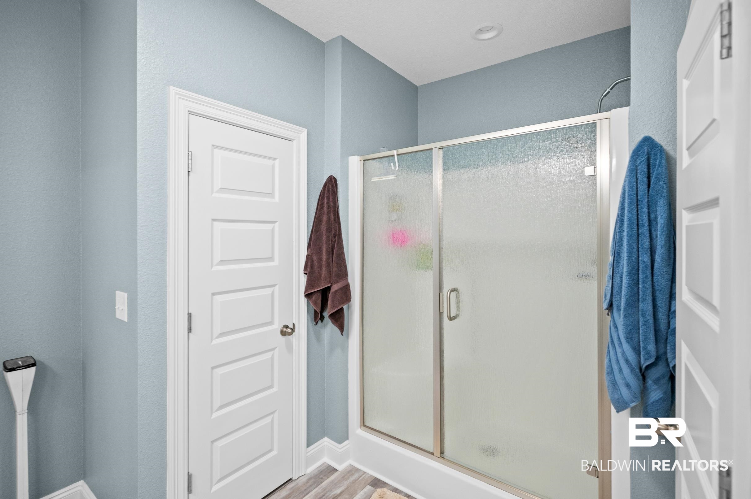 1700 South Juniper Street Foley, AL 36535 - Photo 26 of 51 Bathroom featuring hardwood / wood-style flooring and walk in shower