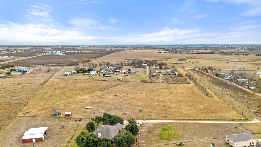 20646 Cameron Road Coupland, TX 78615 - Photo 12 of 24 an aerial view of ocean and residential houses with outdoor space