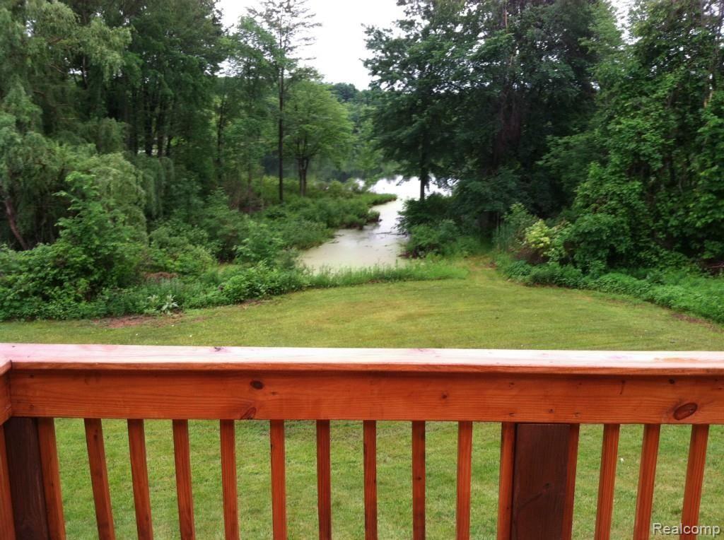 4493 McDowell Road Lapeer, MI 48446 - Photo 3 of 19 Back deck over looking Lake McDowell
