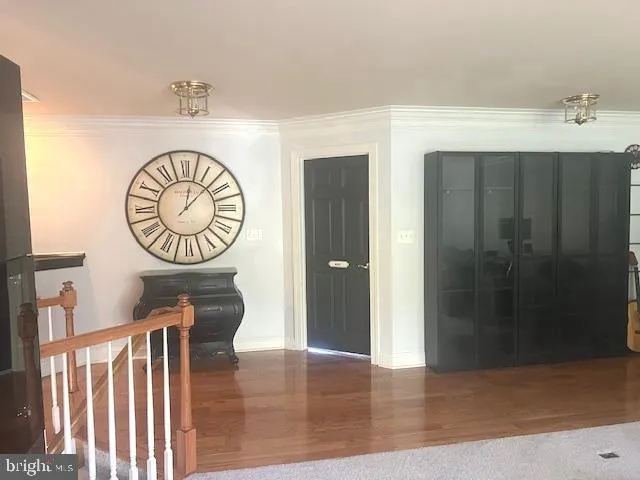 a spacious bedroom with a bed and a couch