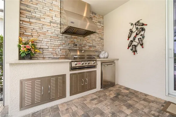 a kitchen with a stove and a sink