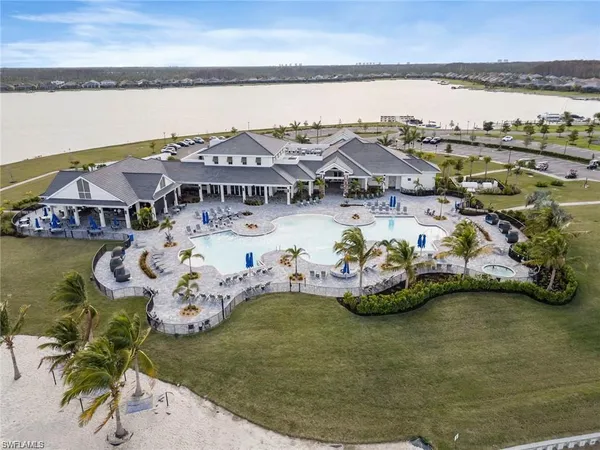 an aerial view of a house with outdoor space