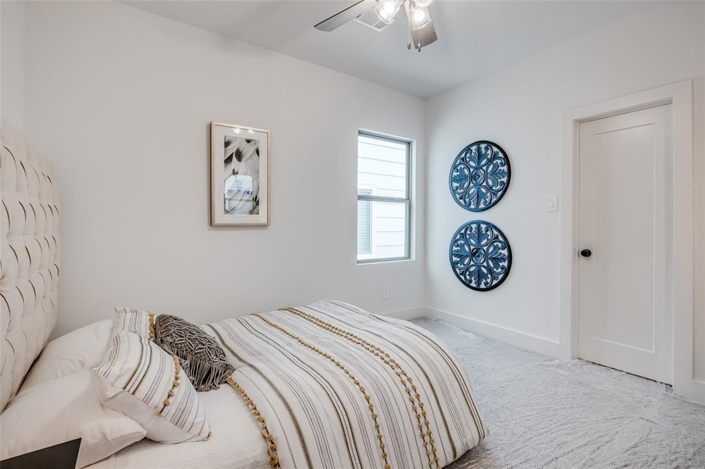 4403 Greeley Street Houston, TX 77006 - Photo 24 of 28 a bedroom with a bed and a window