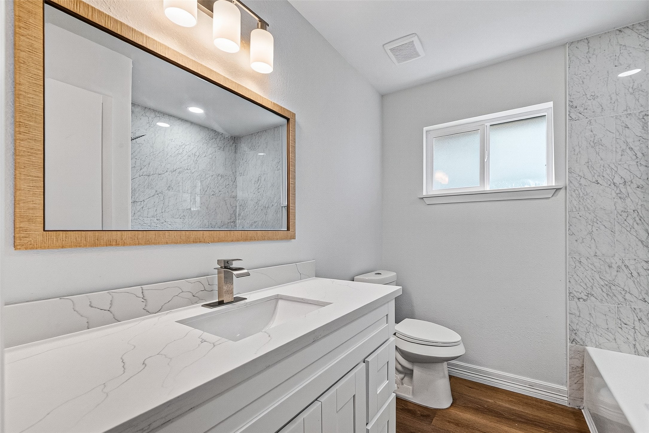 9723 Ebb Street Houston, TX 77089 - Photo 13 of 20 Updated secondary bathroom.