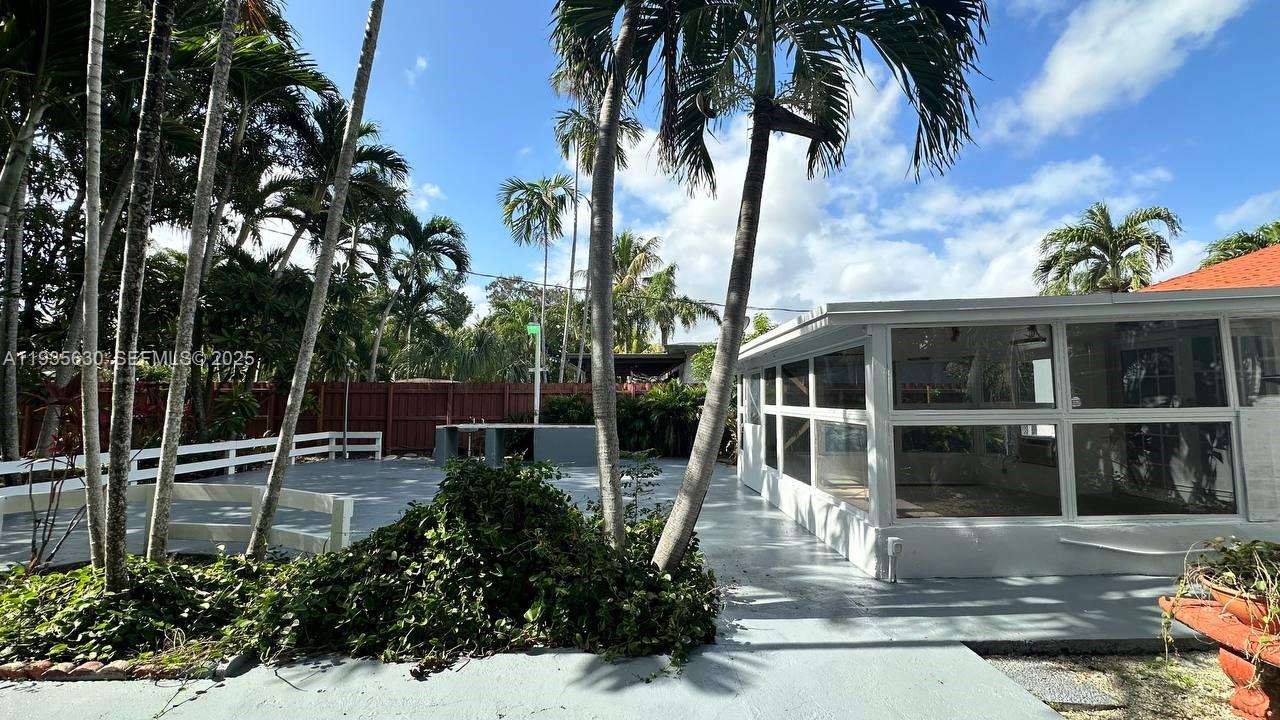 1824 Southwest 24th Street Miami, FL 33145 - Photo 30 of 35 a view of a house with a yard