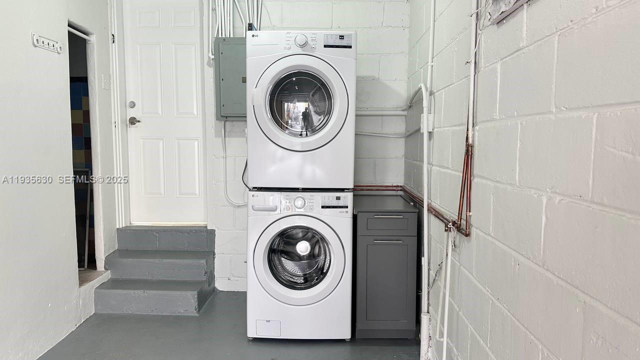 1824 Southwest 24th Street Miami, FL 33145 - Photo 34 of 35 a utility room with dryer and washer