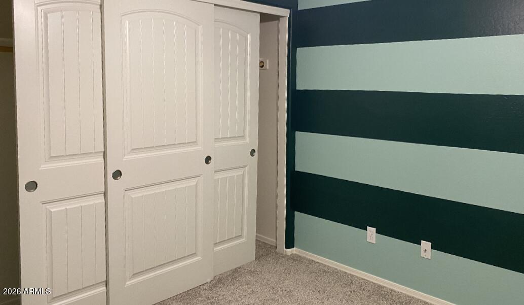 10225 West Camelback Road, Unit 19 Phoenix, AZ 85037 - Photo 25 of 51 a view of walk in closet