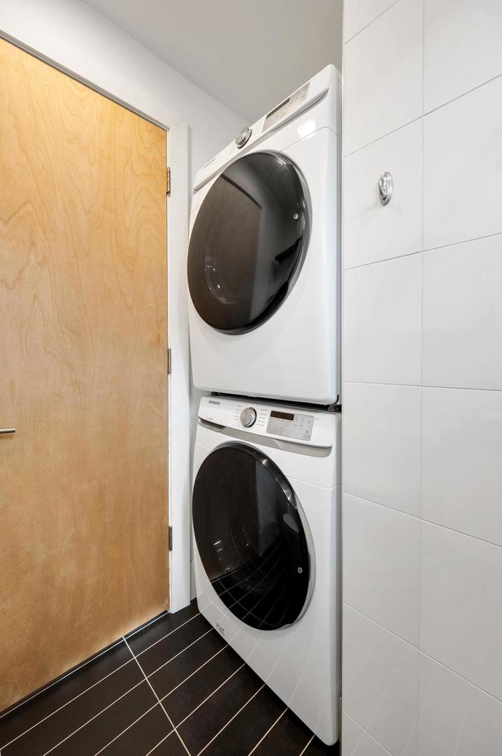 5469 South Ingleside Avenue, Unit 2N Chicago, IL 60615 - Photo 14 of 15 a close up view of a washer and dryer