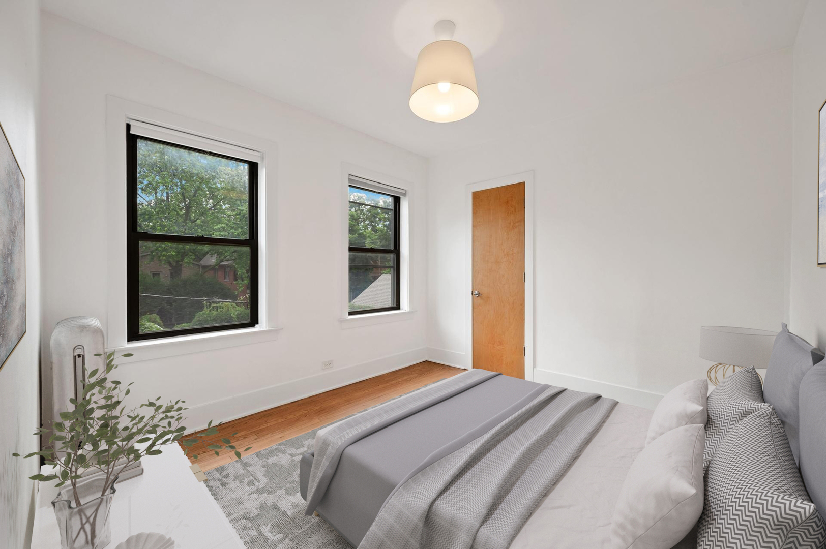 5469 South Ingleside Avenue, Unit 2N Chicago, IL 60615 - Photo 10 of 15 a bedroom with a bed and a window