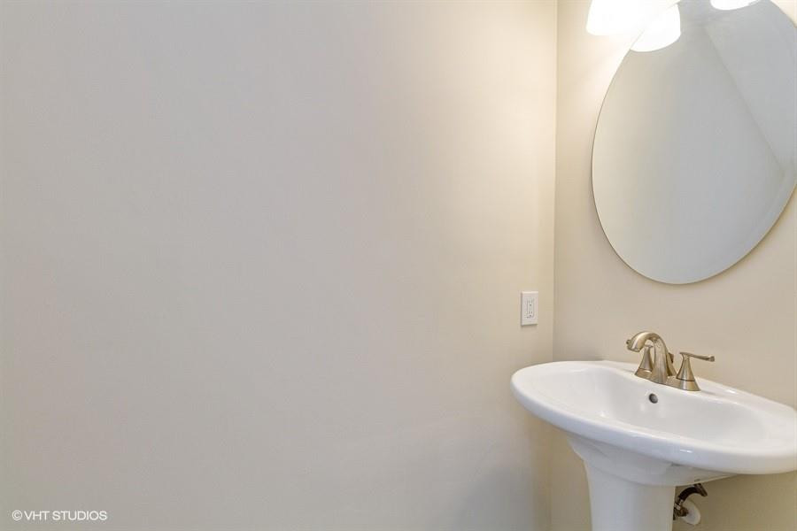 7463 Viscaya Circle Margate, FL 33063 - Photo 20 of 22 a bathroom with a sink and a mirror