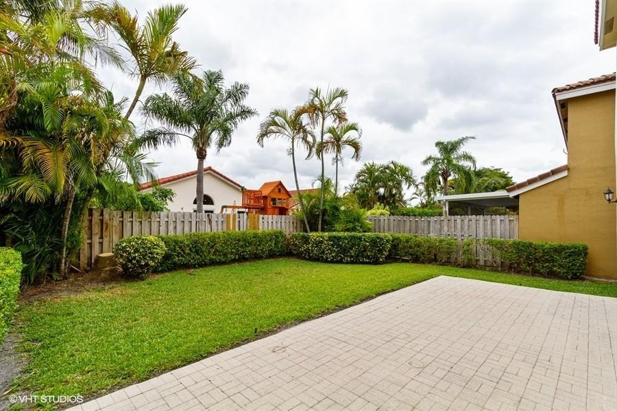 7463 Viscaya Circle Margate, FL 33063 - Photo 22 of 22 a view of a garden