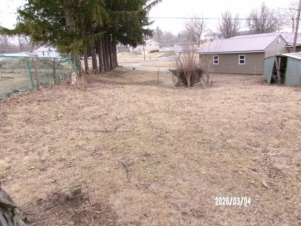 a view of a house with a snow