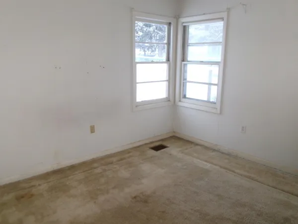 an empty room with a window