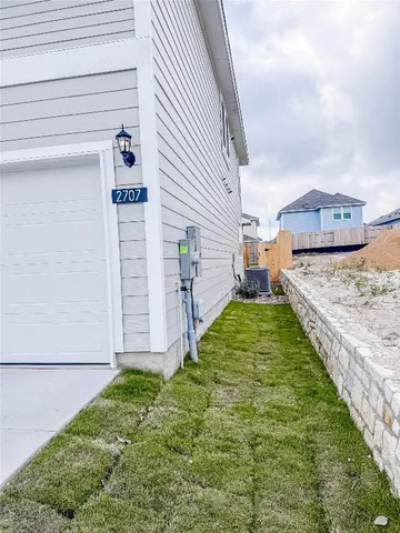 a view of a backyard with plants