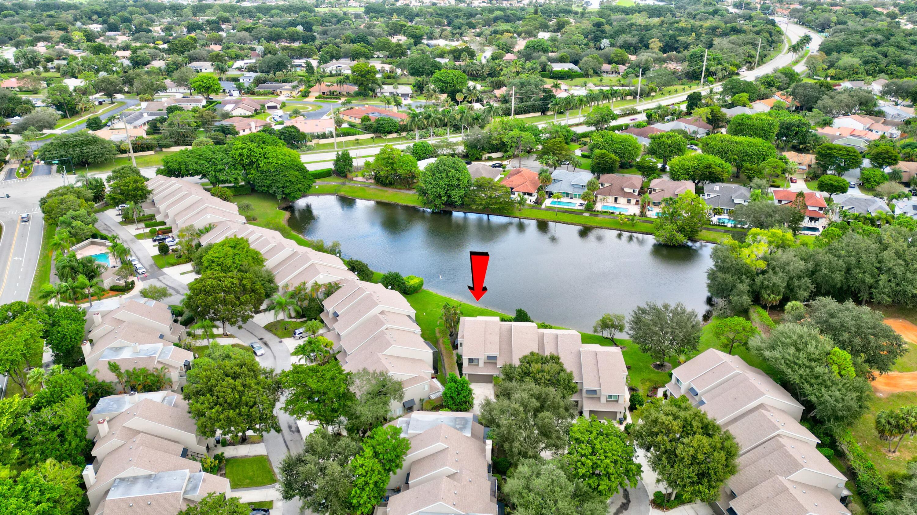 6663 Boca Pines Trail, Unit A Boca Raton, FL 33433 - Photo 15 of 60 a view of a lake with a city