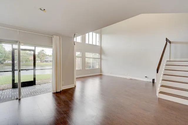a view of staircase with white walls and floors