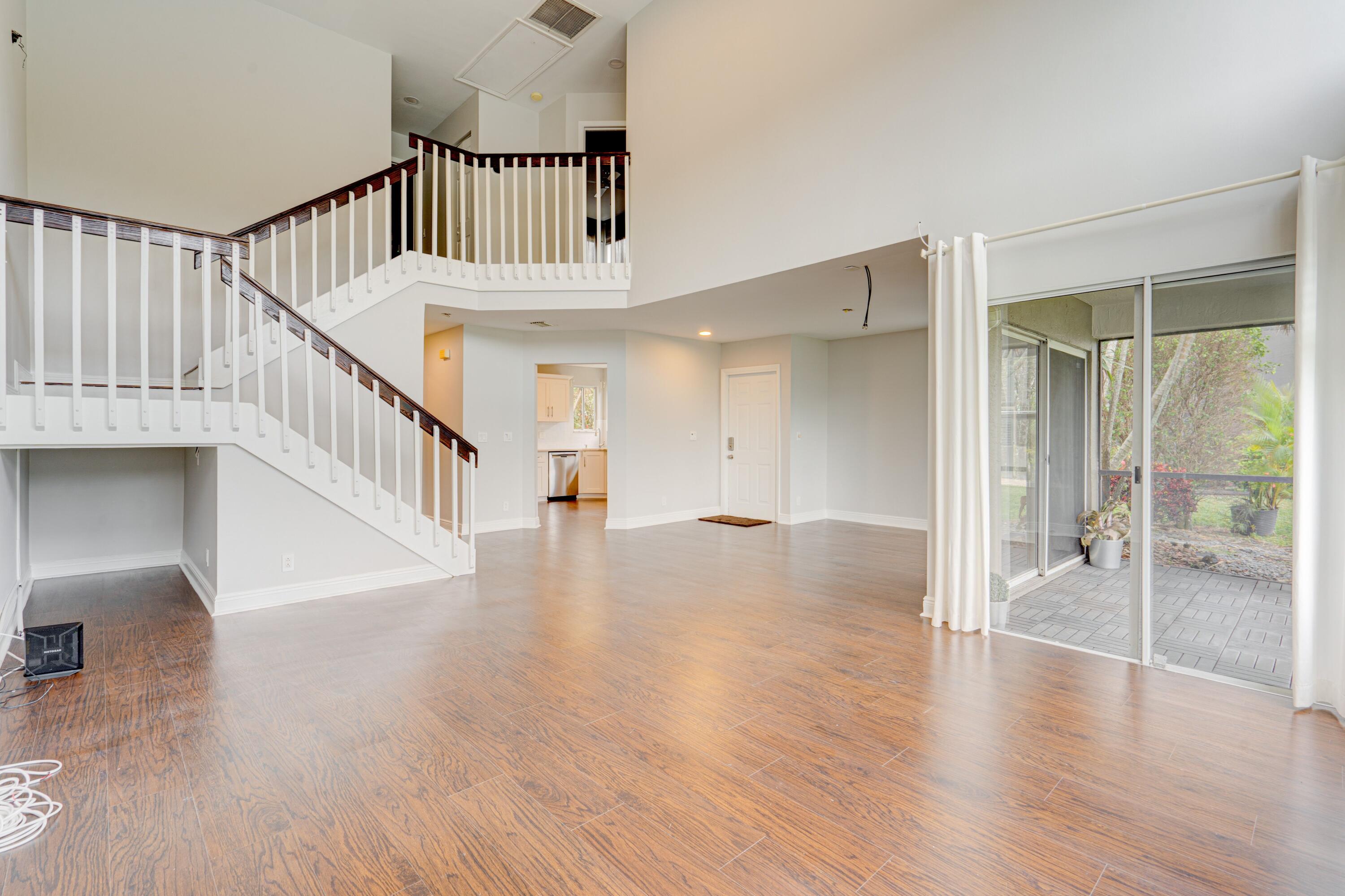 6663 Boca Pines Trail, Unit A Boca Raton, FL 33433 - Photo 33 of 60 a view of staircase with white walls and floors