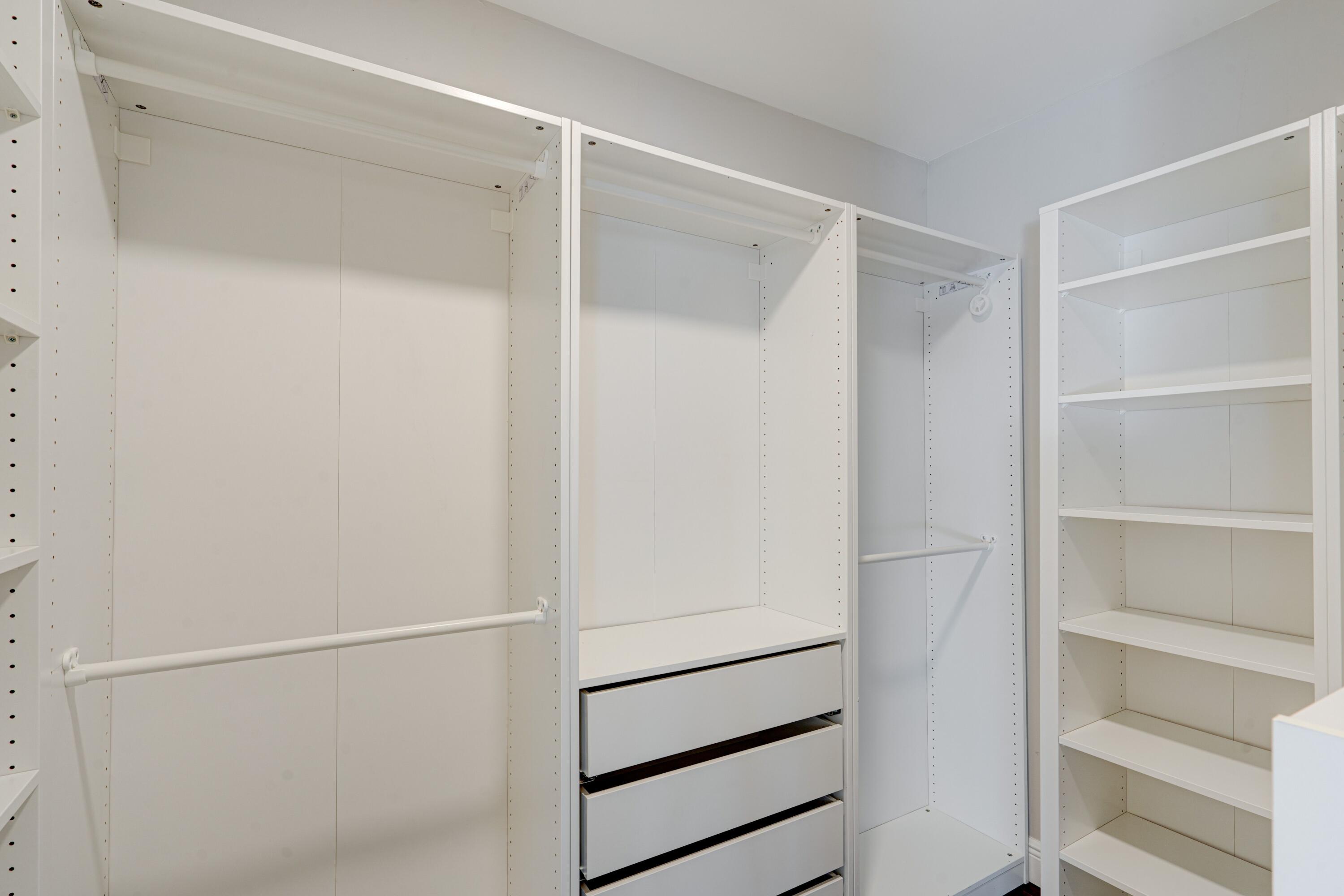 6663 Boca Pines Trail, Unit A Boca Raton, FL 33433 - Photo 59 of 60 a view of walk in closet with empty racks