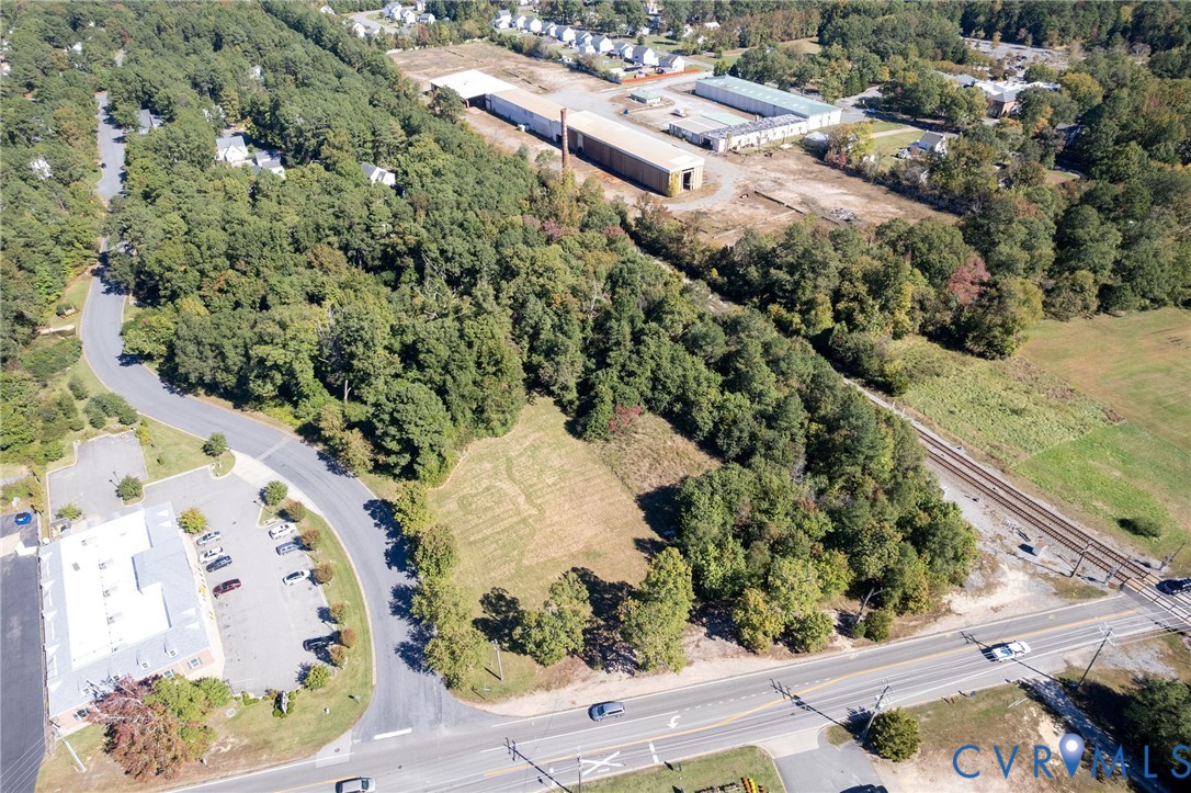3002 Mountain Road Glen Allen, VA 23060 - Photo 6 of 13 Aerial overview showcasing a wooded lot with a cle