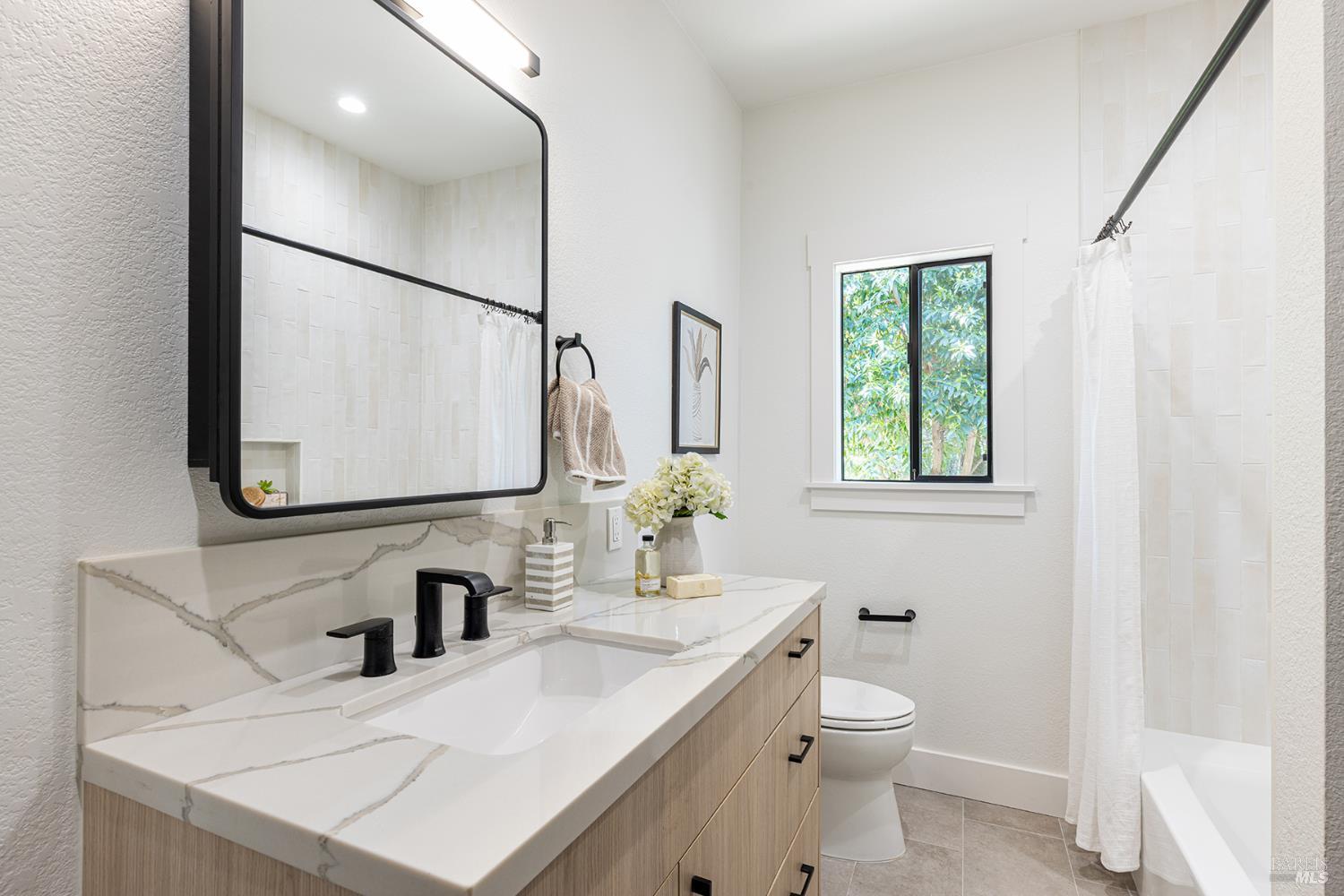 14734 Young Road Healdsburg, CA 95448 - Photo 32 of 47 a bathroom with a sink toilet and mirror