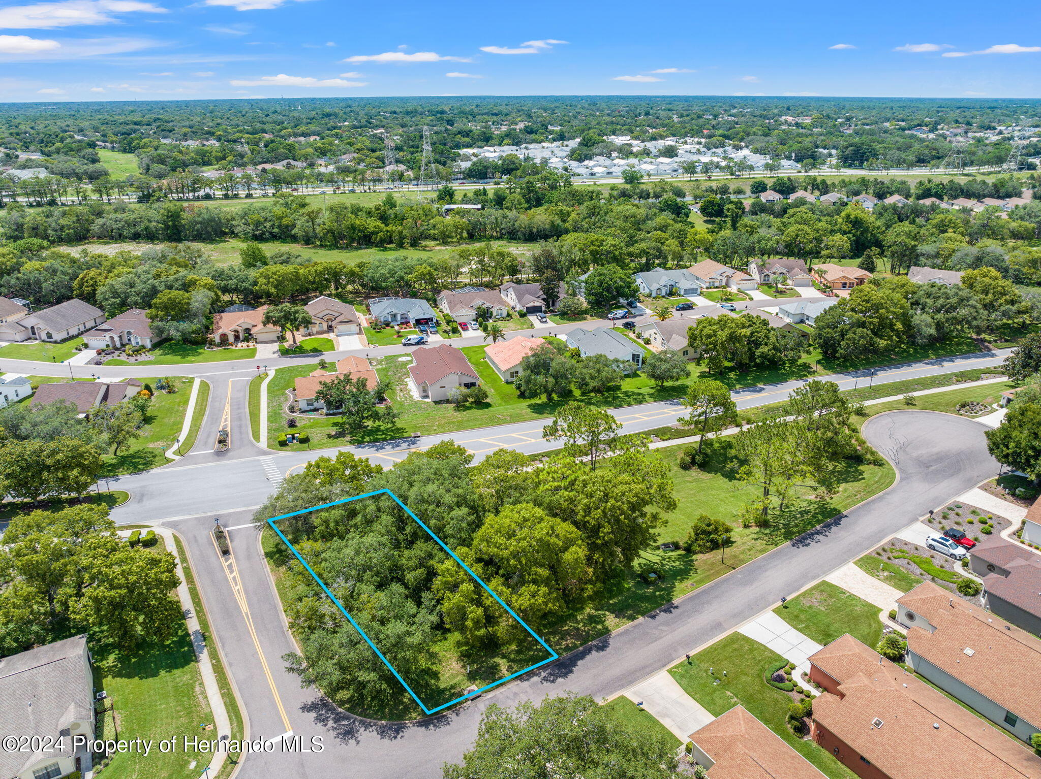 449 Candlestone Court Spring Hill, FL 34609 - Photo 3 of 12 a view of a city with a lake