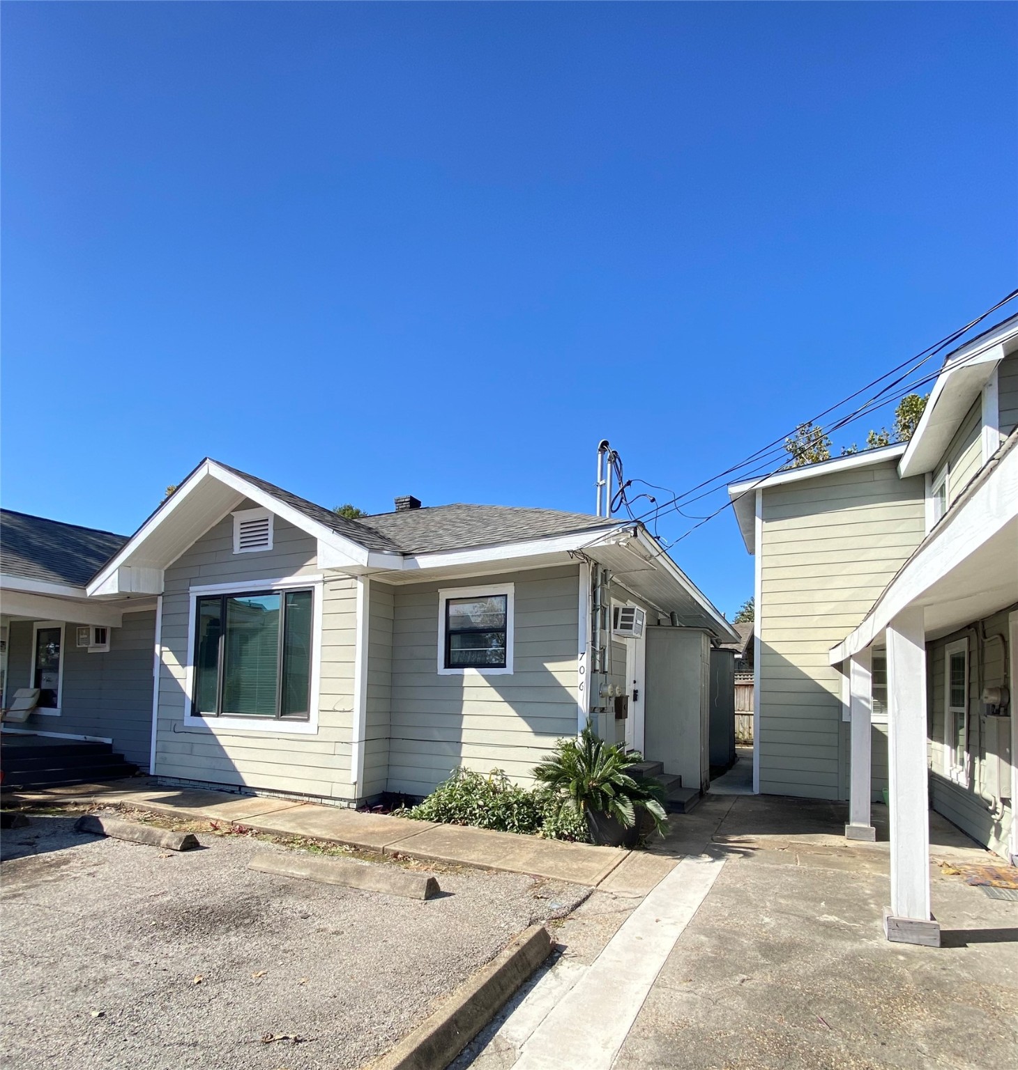 706 Dumble Street Houston, TX 77023 - Photo 1 of 13 a front view of a house with a garden