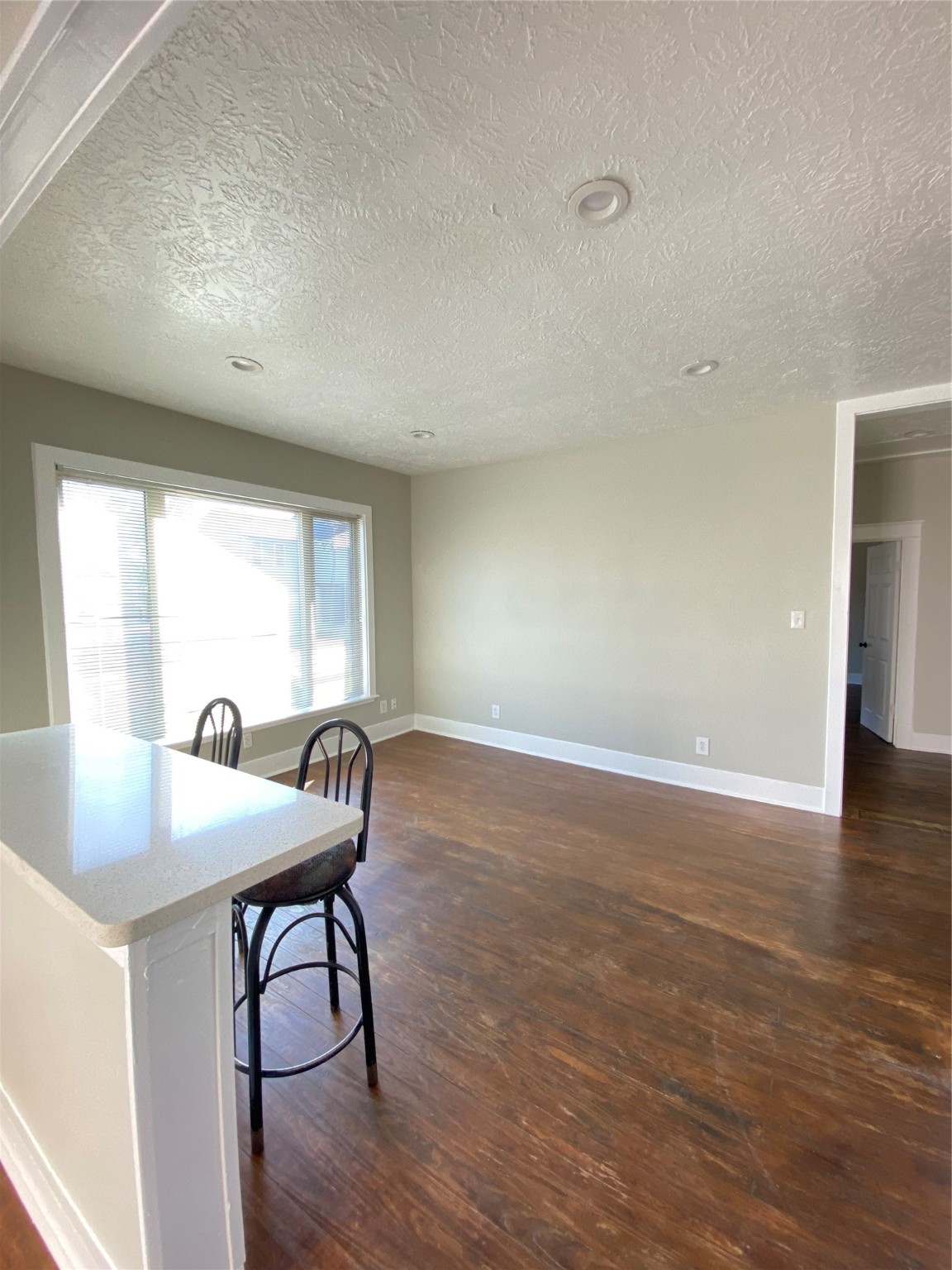 706 Dumble Street Houston, TX 77023 - Photo 4 of 13 a workspace with furniture and window