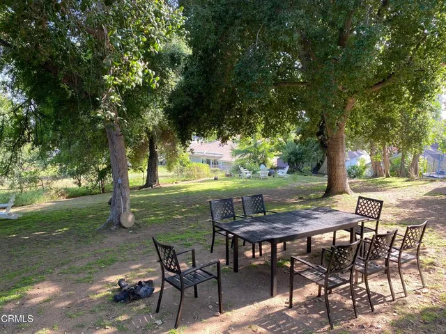 a view of backyard with green space