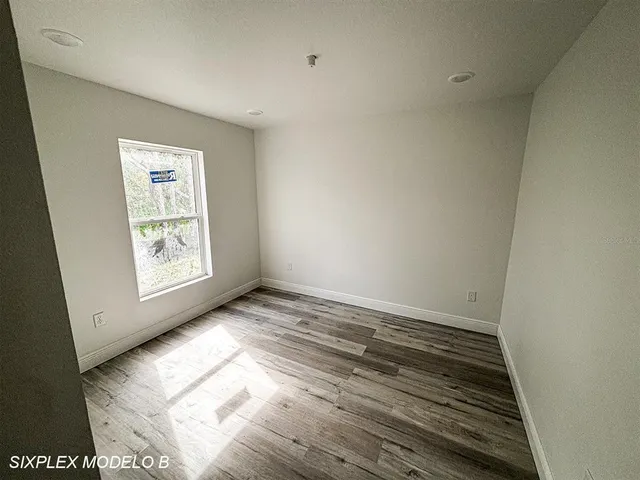 a view of an empty room and window