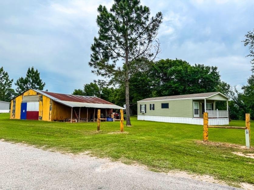 891 Tbd County Road Jewett, TX 75846 - Photo 1 of 22 a front view of house with yard and green space