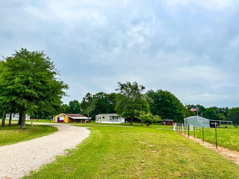 891 Tbd County Road Jewett, TX 75846 - Photo 18 of 22 a house with swimming pool in front of it