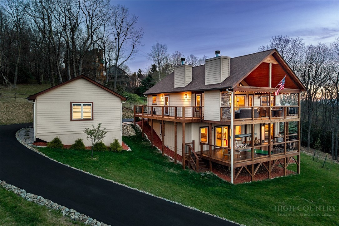 1161 Grandview Dr Extension Boone, NC 28607 - Photo 41 of 43 a front view of a house with garden