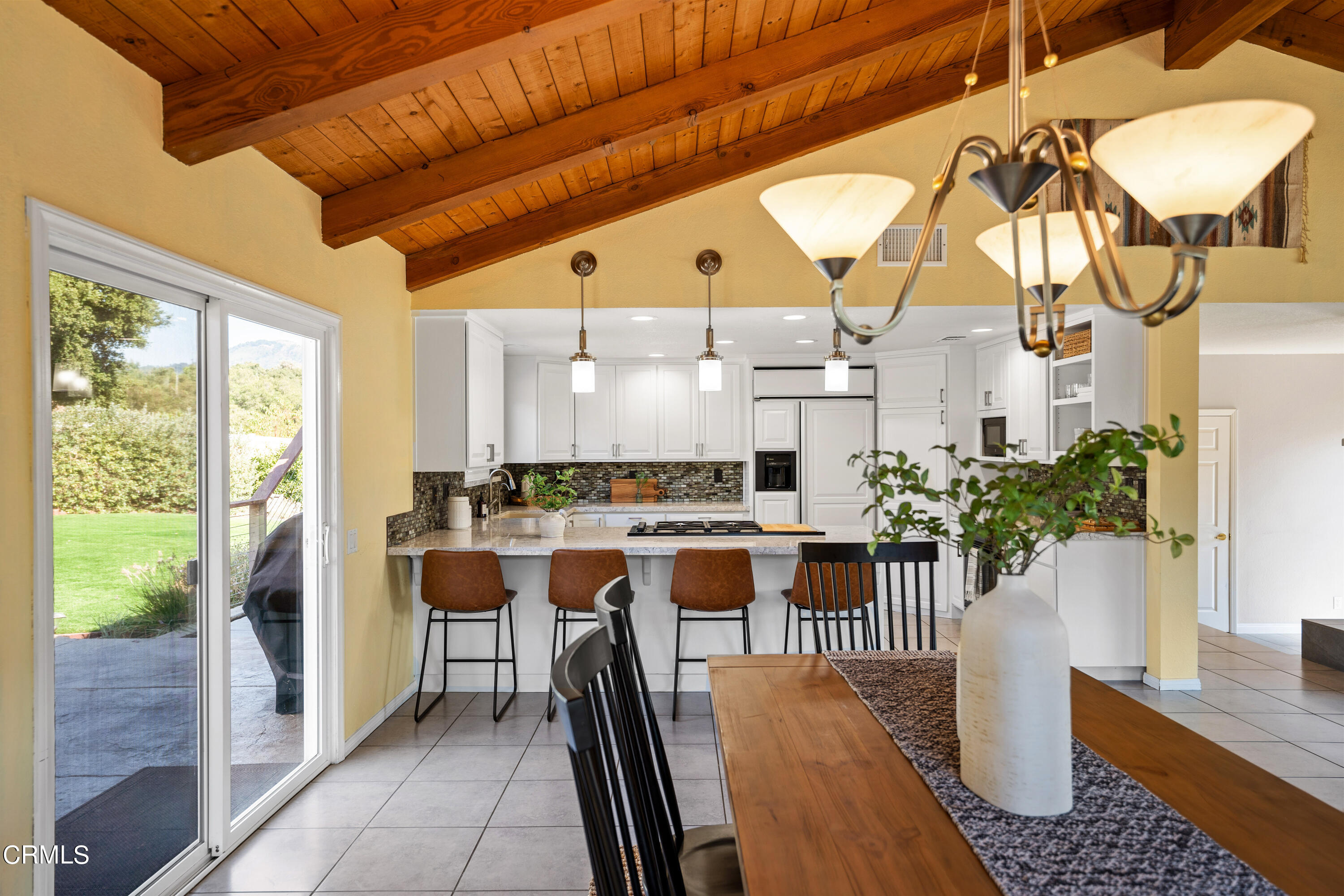 531 Ridgeline Drive Oak View, CA 93022 - Photo 13 of 36 a dining room with a table and chairs