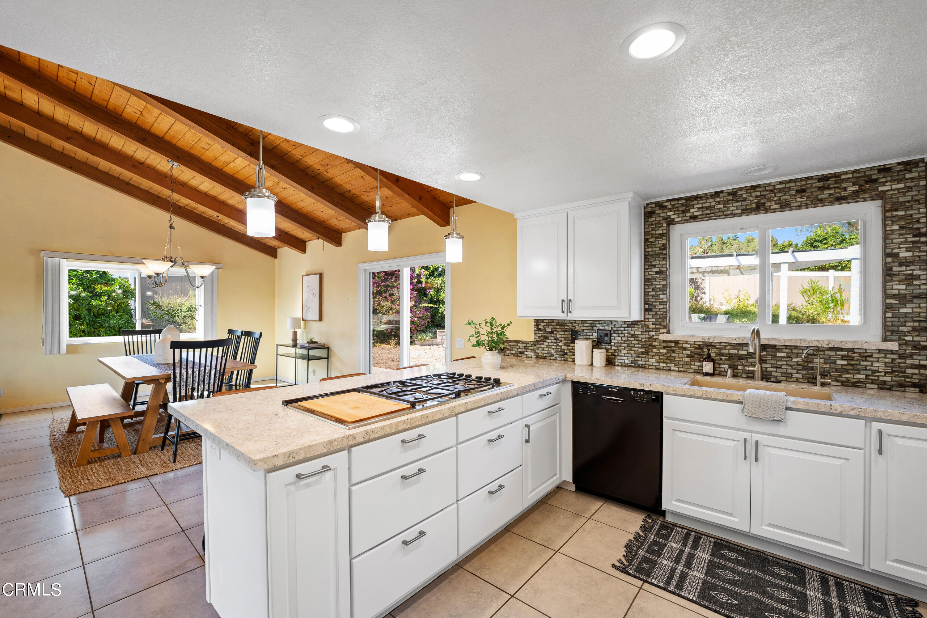 531 Ridgeline Drive Oak View, CA 93022 - Photo 15 of 36 a kitchen with a sink stove and cabinets