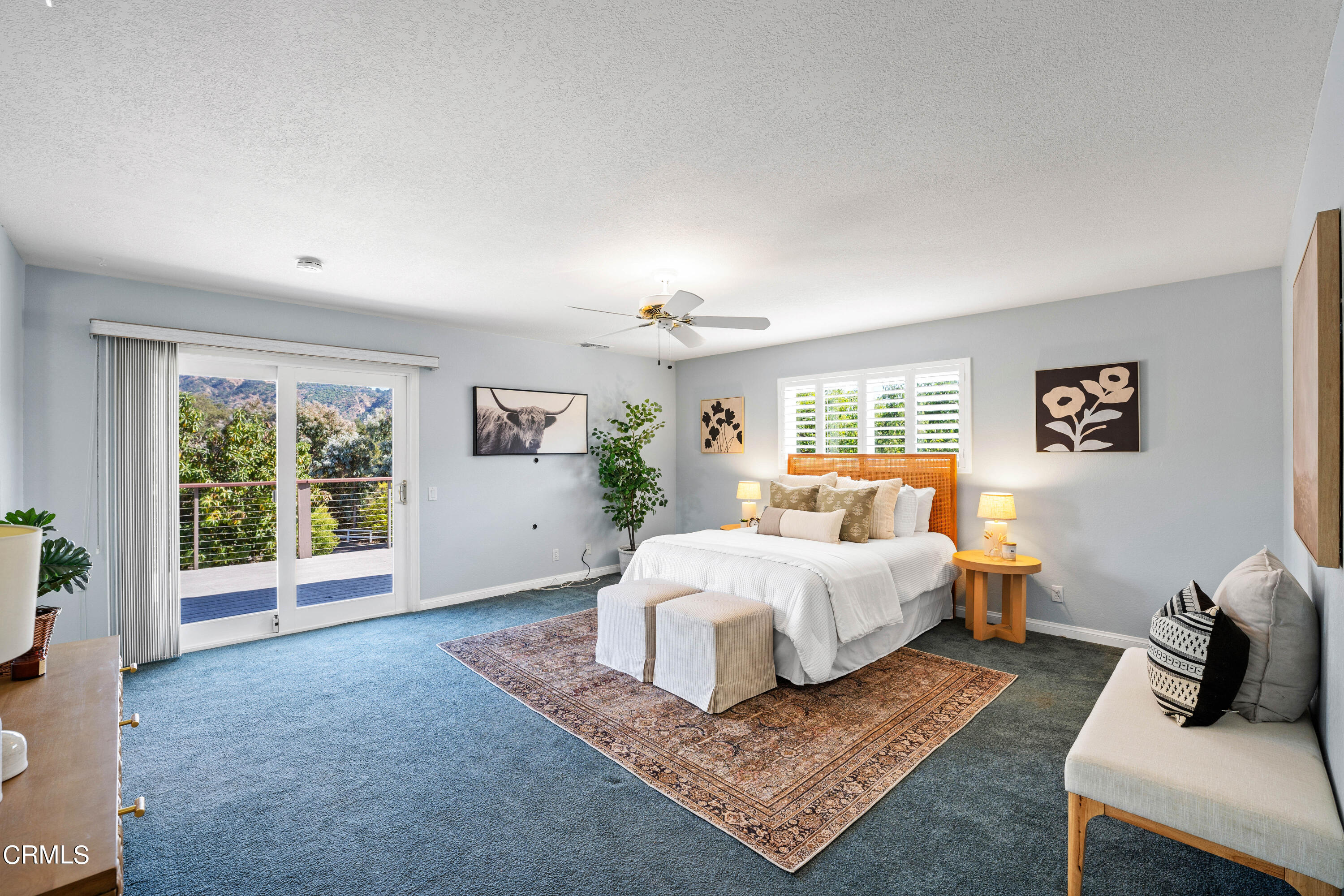 531 Ridgeline Drive Oak View, CA 93022 - Photo 17 of 36 a spacious bedroom with a bed and glass window