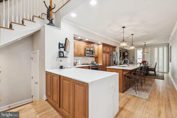 a view of a dining room with furniture and window