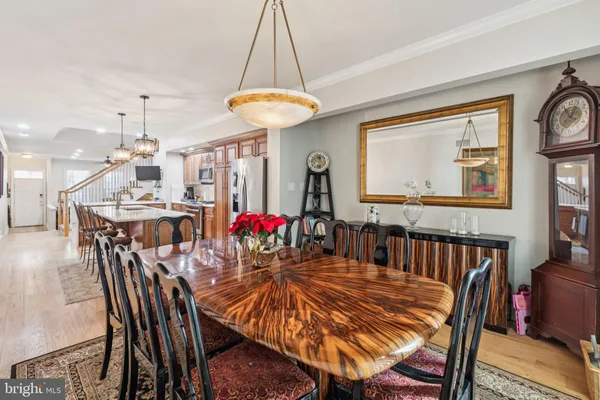 a bathroom with a sink mirror and toilet