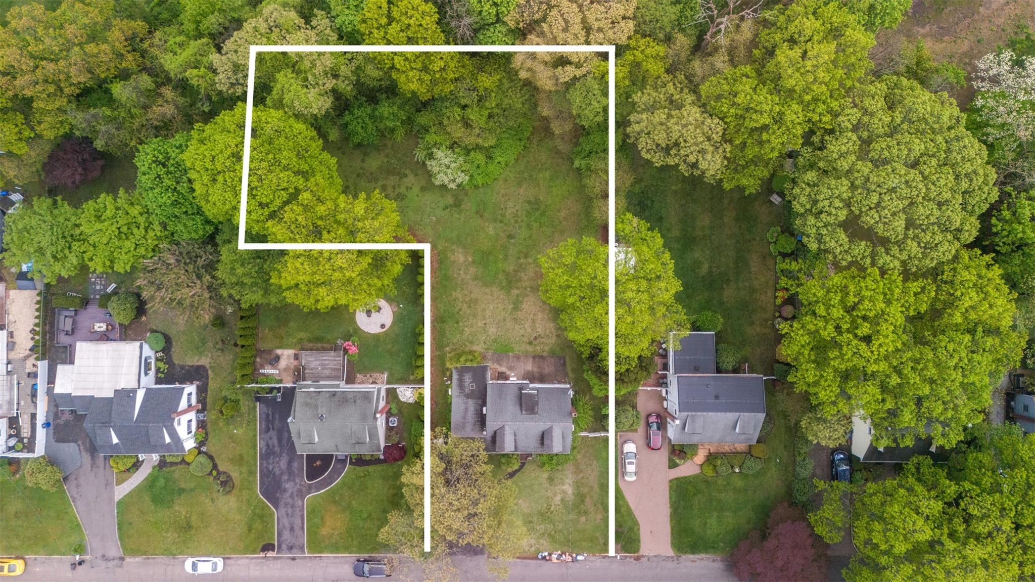 51 Joline Road Port Jefferson Station, NY 11776 - Photo 11 of 38 an aerial view of residential houses with outdoor space and trees