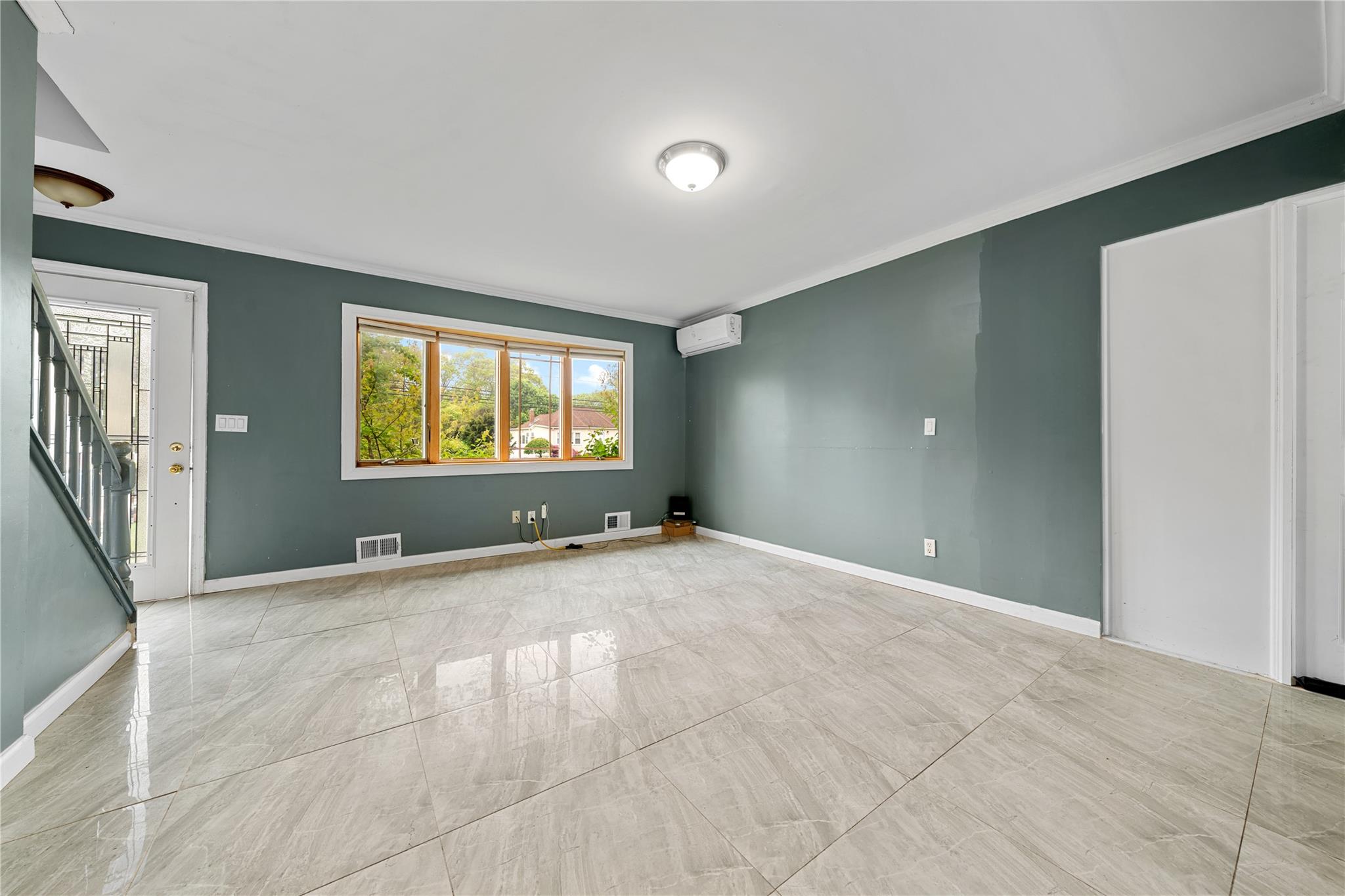 51 Joline Road Port Jefferson Station, NY 11776 - Photo 15 of 38 a view of an empty room with a window