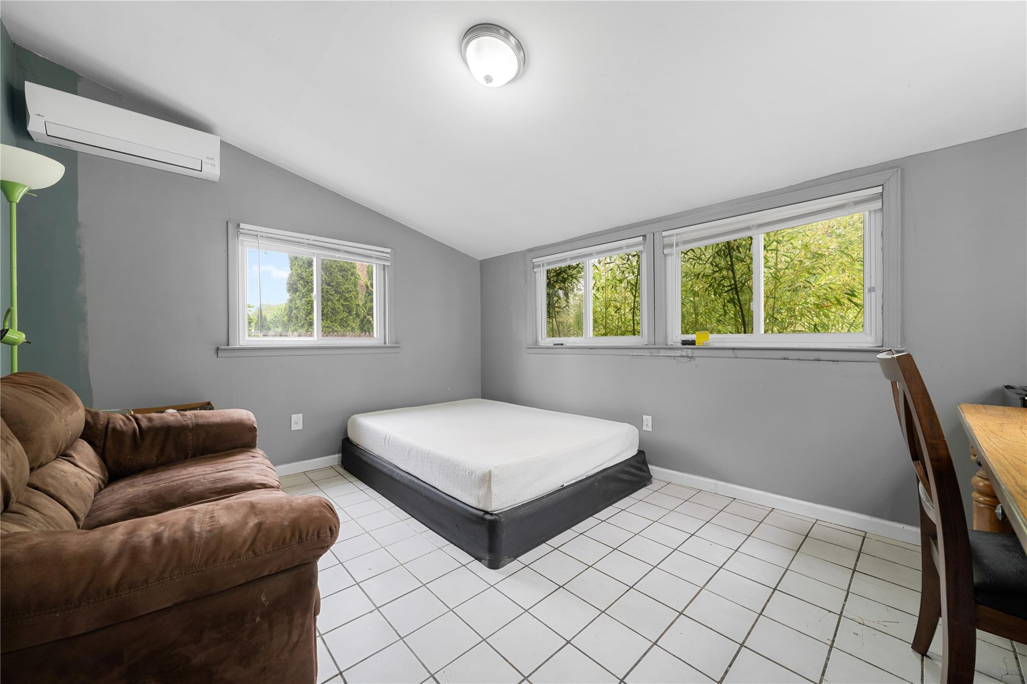 51 Joline Road Port Jefferson Station, NY 11776 - Photo 21 of 38 a bedroom with furniture and a window