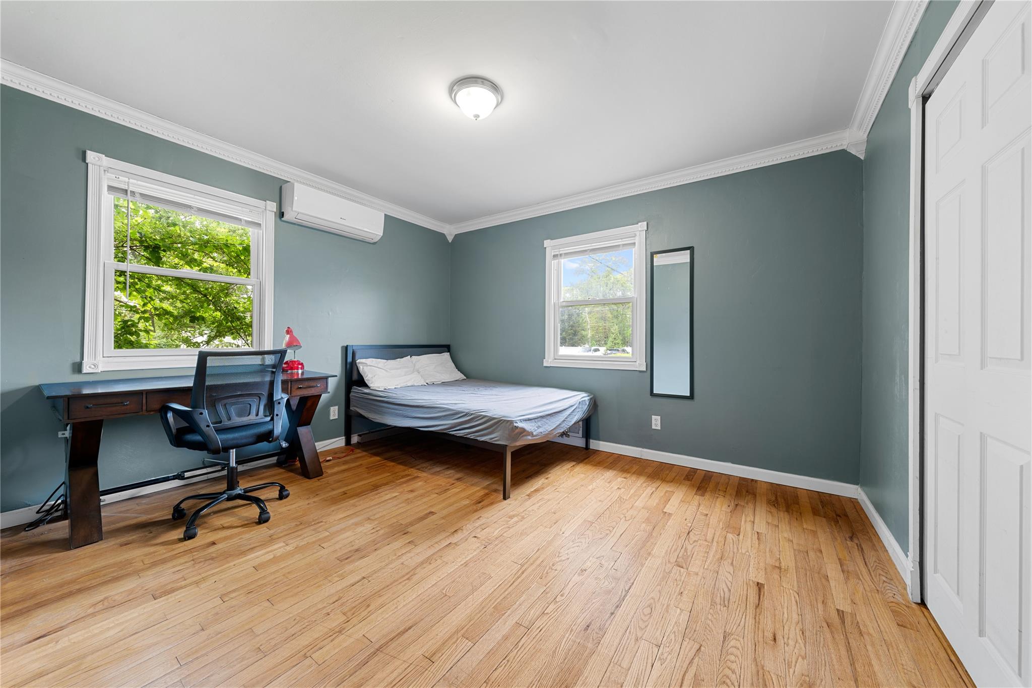51 Joline Road Port Jefferson Station, NY 11776 - Photo 24 of 38 a view of a workspace with furniture and a window