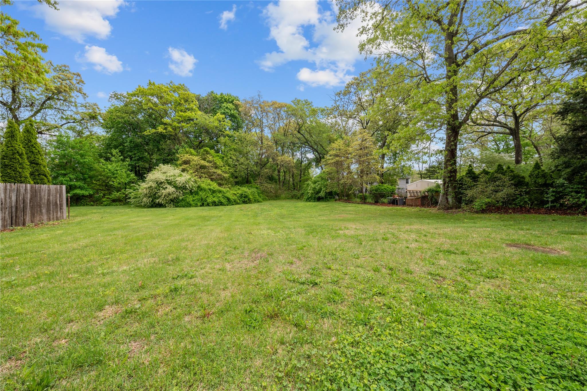 51 Joline Road Port Jefferson Station, NY 11776 - Photo 6 of 38 a view of a garden with trees