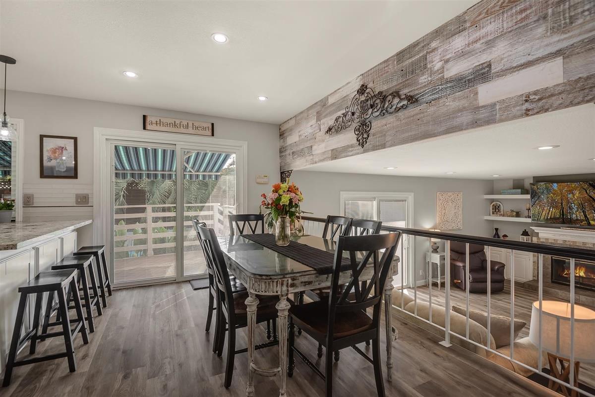 1428 Eagles Nest Lane Gilroy, CA 95020 - Photo 15 of 38 a dining room with furniture and wooden floor