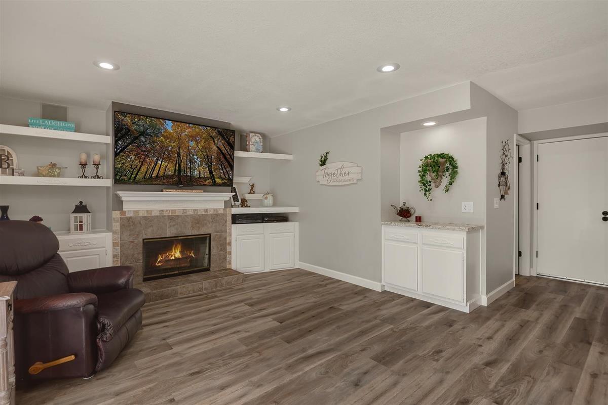 1428 Eagles Nest Lane Gilroy, CA 95020 - Photo 19 of 38 a living room with furniture and a fireplace