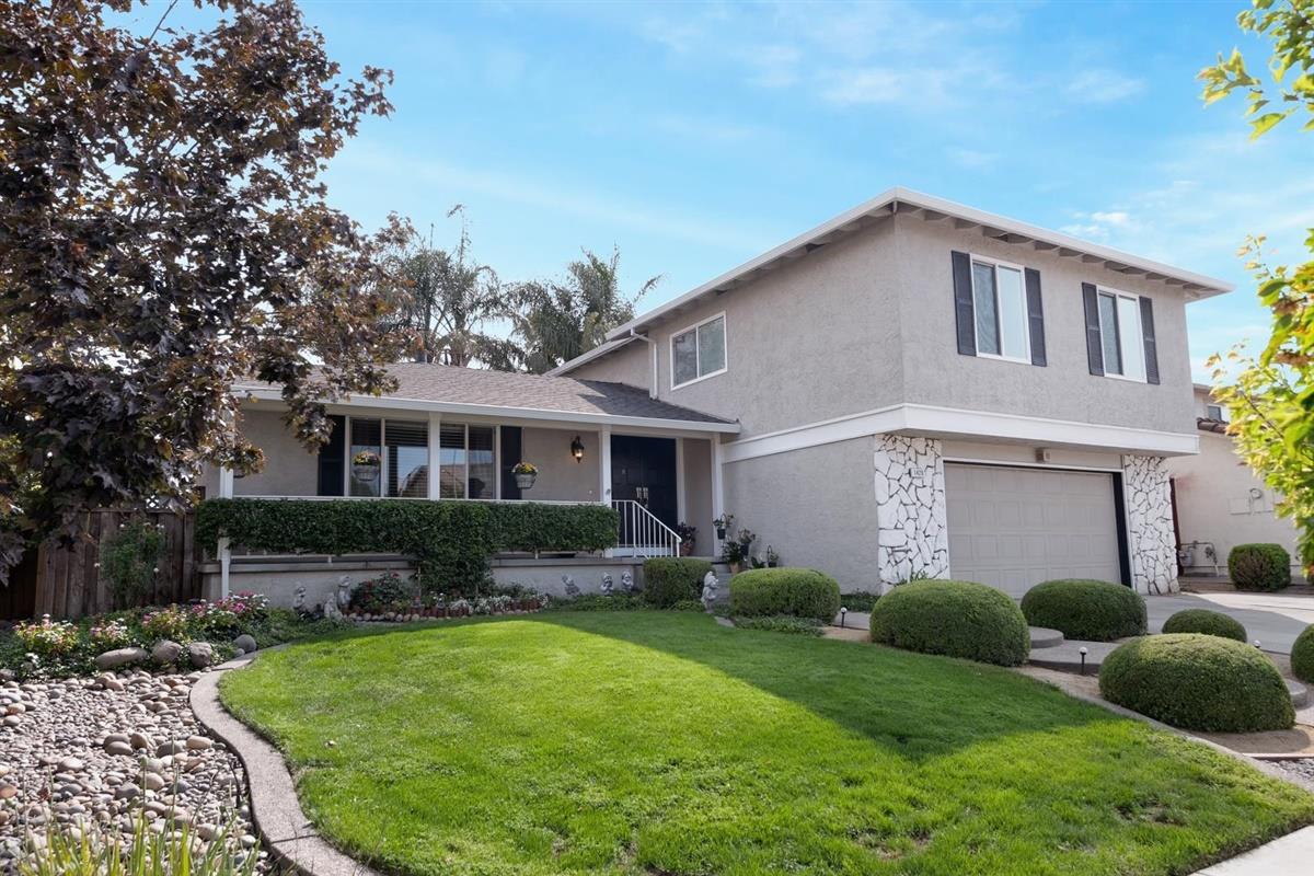 1428 Eagles Nest Lane Gilroy, CA 95020 - Photo 2 of 38 a front view of a house with garden