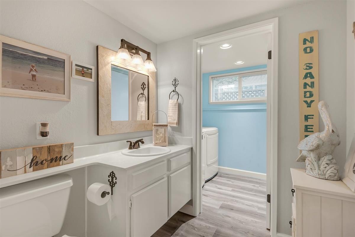 1428 Eagles Nest Lane Gilroy, CA 95020 - Photo 21 of 38 a bathroom with a double vanity sink mirror and
