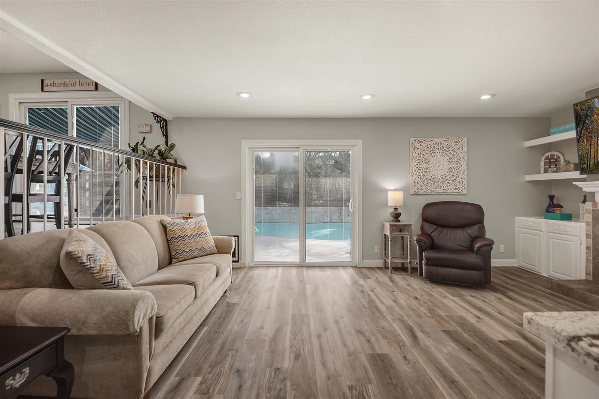 1428 Eagles Nest Lane Gilroy, CA 95020 - Photo 23 of 38 a living room with furniture and a large window