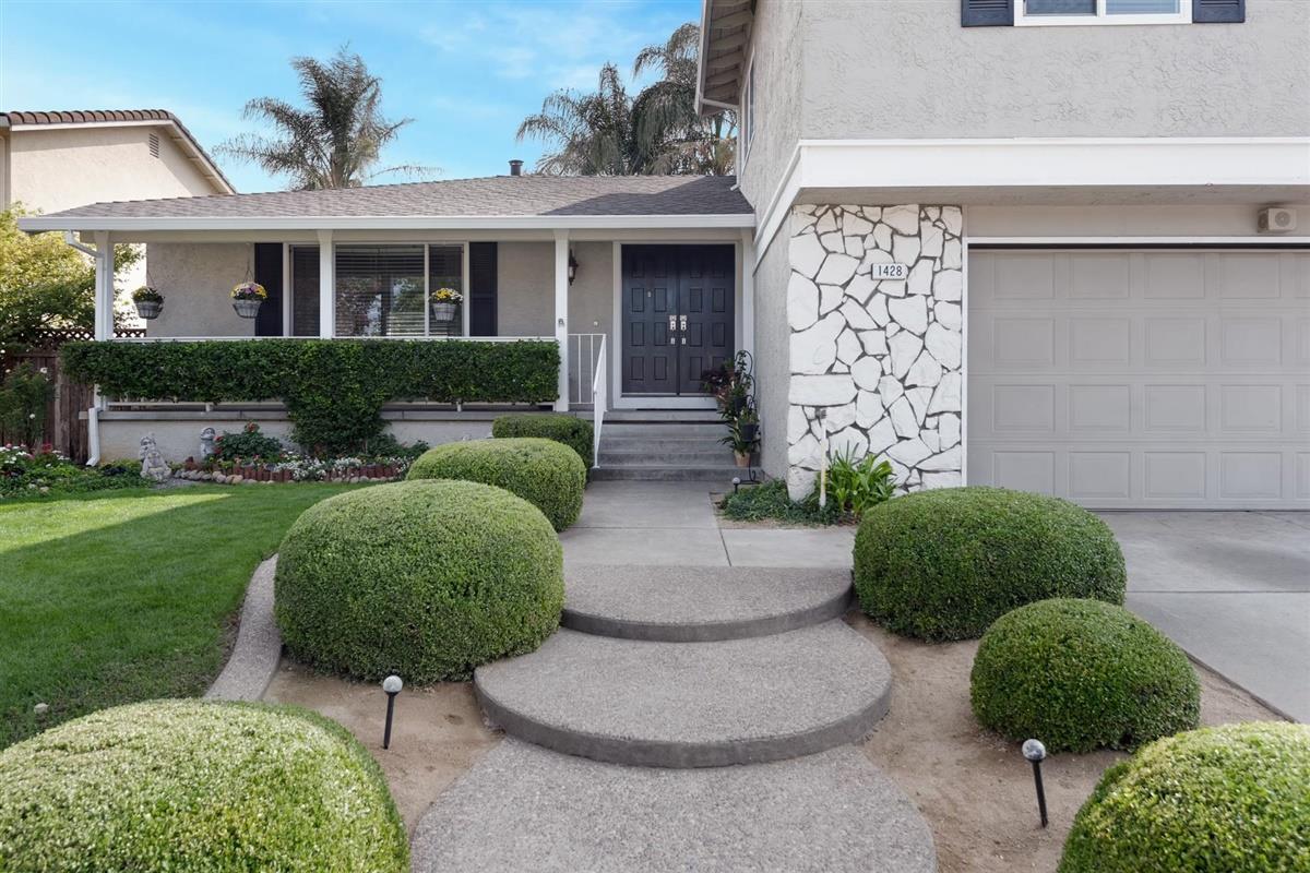 1428 Eagles Nest Lane Gilroy, CA 95020 - Photo 3 of 38 a view of a house with a garden
